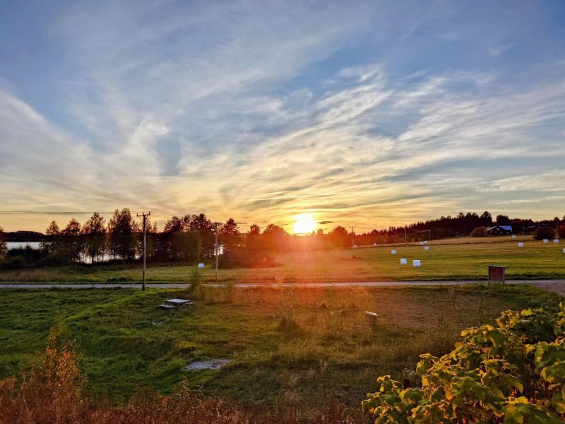 Ställplats6 Solnedgång över ställplatser på Strömgården 1884.